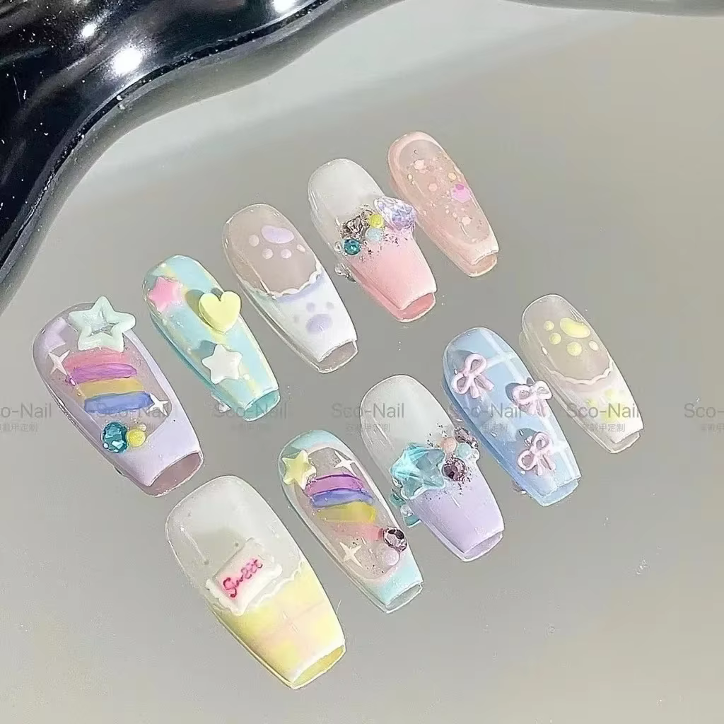 Faux ongles à porter faits main, style bonbon et pudding, avec motifs doux et mignons (nœuds, étoile