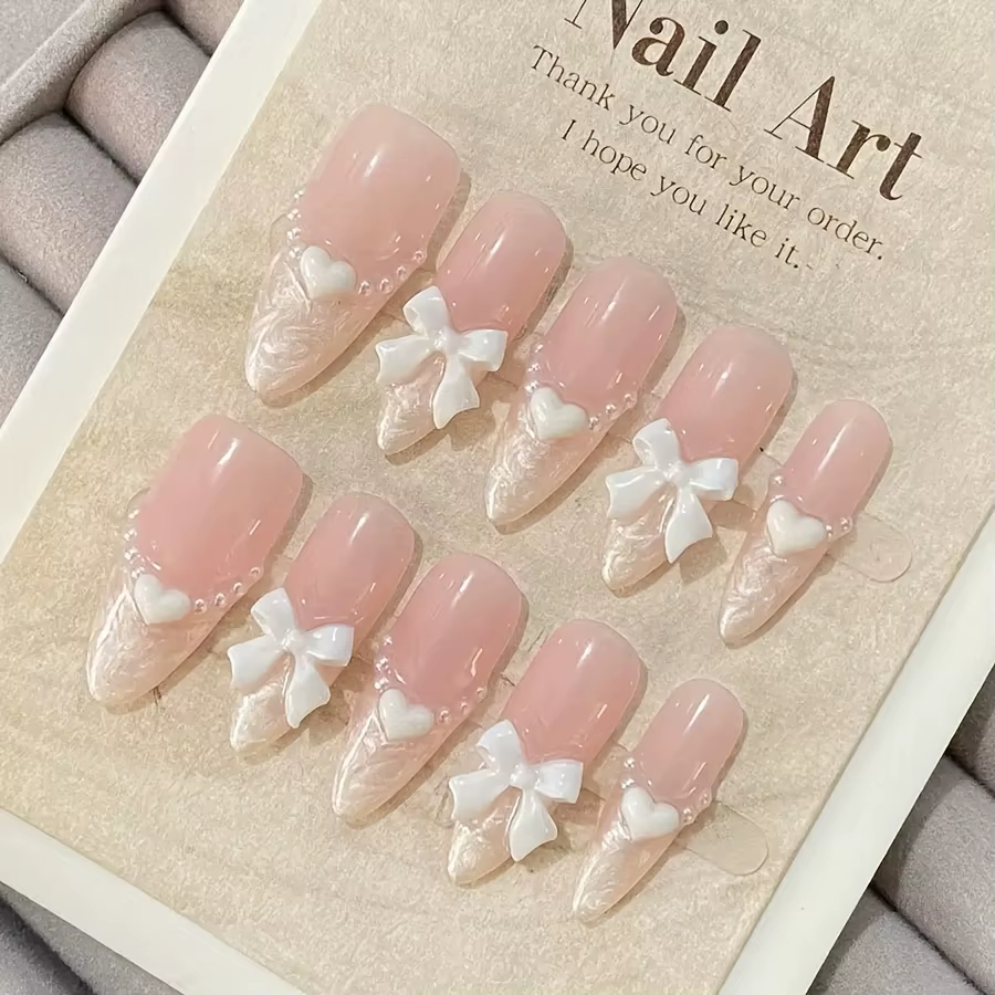 Faux ongles français haut de gamme en forme de cœur, nœud rose, faits à la main, patchs pour ongles
