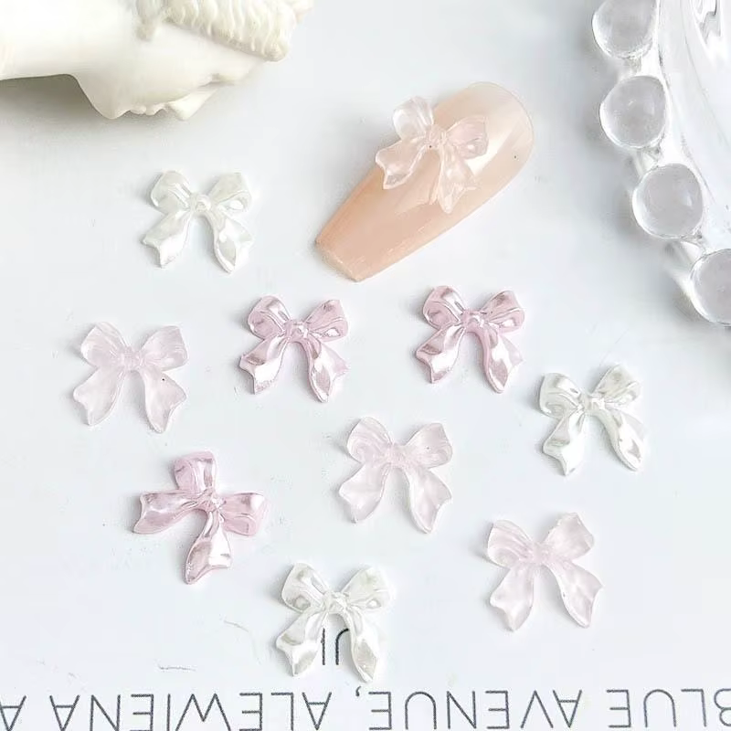 50pcs 3D doux nacré brillant ruban arc résine ongles breloques ballerine nœud papillon Nail Art déco