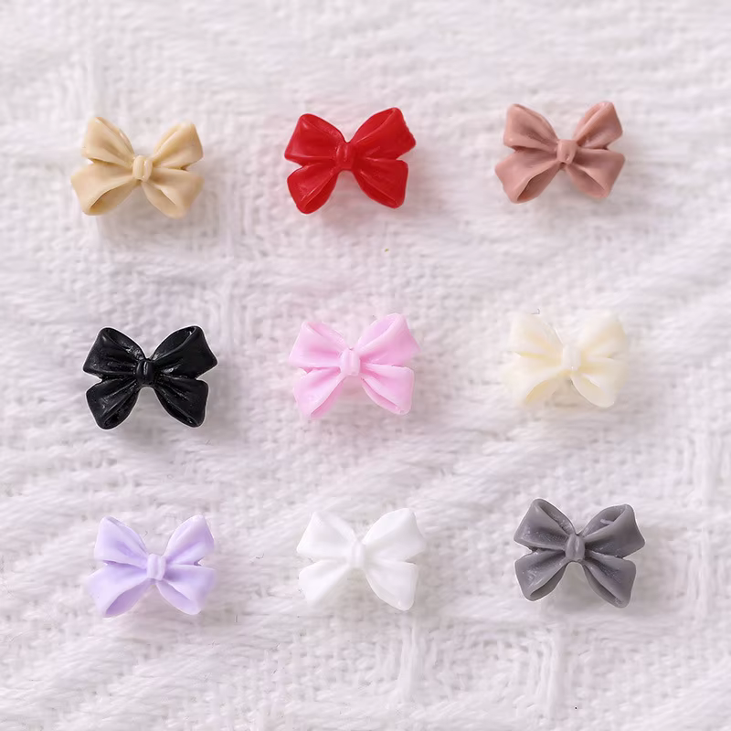 50/100 pièces rose blanc Kawaii arc breloque pour ongles 3D résine nœud papillon Flatback ongles gem