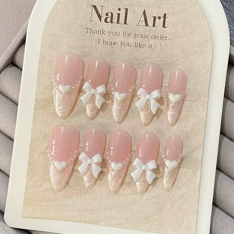 Faux ongles français haut de gamme en forme de cœur, nœud rose, faits à la main, patchs pour ongles
