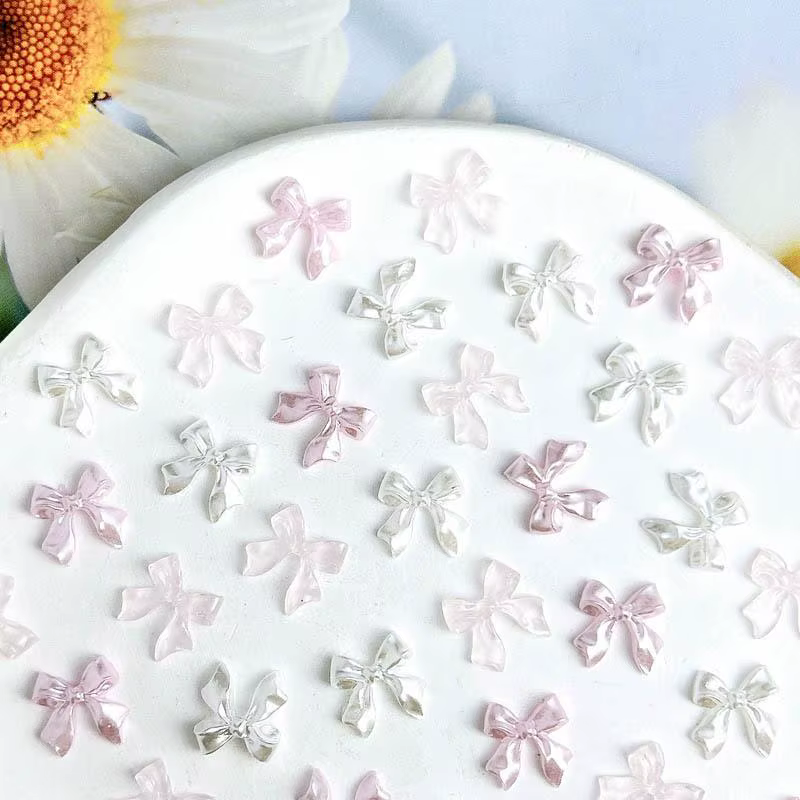 50pcs 3D doux nacré brillant ruban arc résine ongles breloques ballerine nœud papillon Nail Art déco