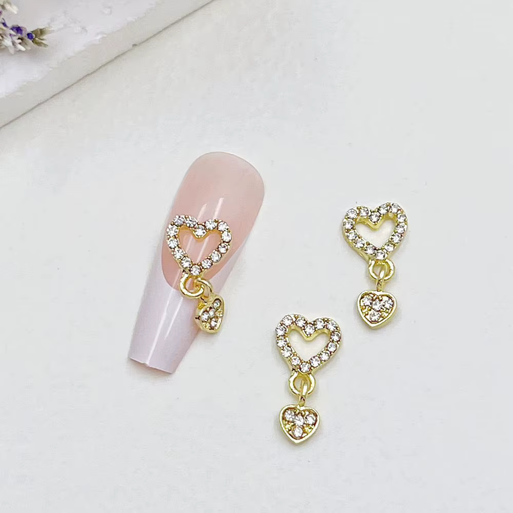 10 pièces coeur balancent ongles breloques 3D alliage luxe ongles strass argent or creux coeur ongle