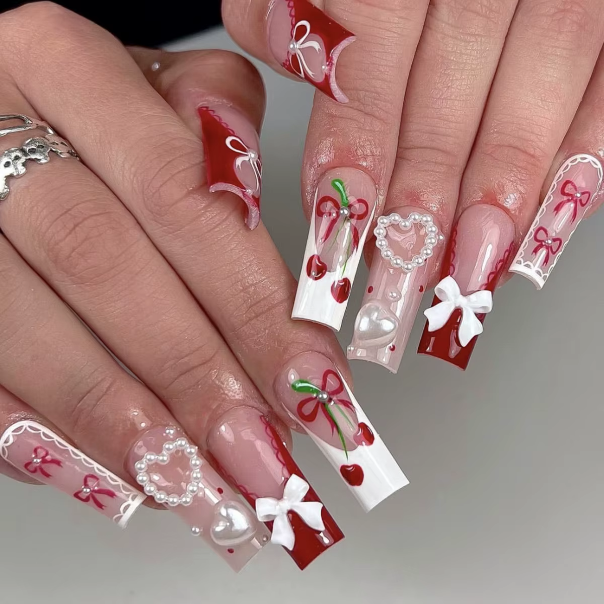 24 faux ongles nude roses avec nœuds 3D et fleurs, à presser, nouvelle collection 2026, style frança