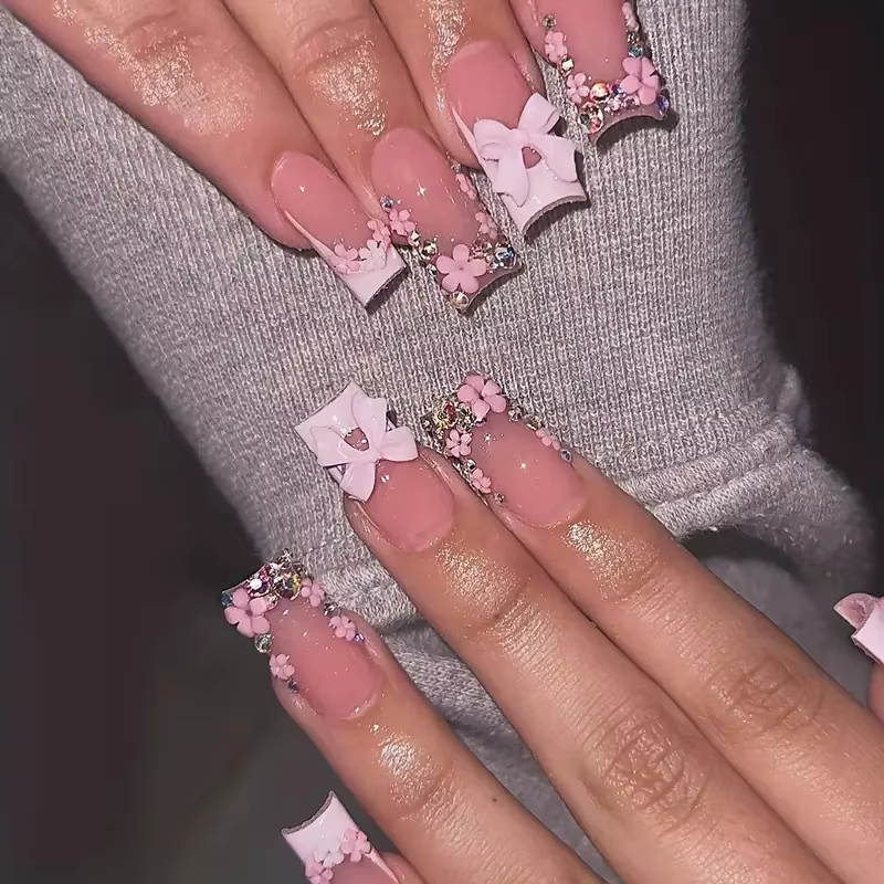 24 faux ongles nude roses avec nœuds 3D et fleurs, à presser, nouvelle collection 2026, style frança