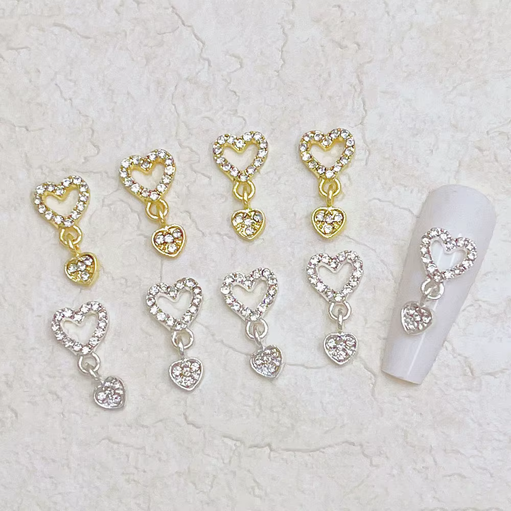 10 pièces coeur balancent ongles breloques 3D alliage luxe ongles strass argent or creux coeur ongle