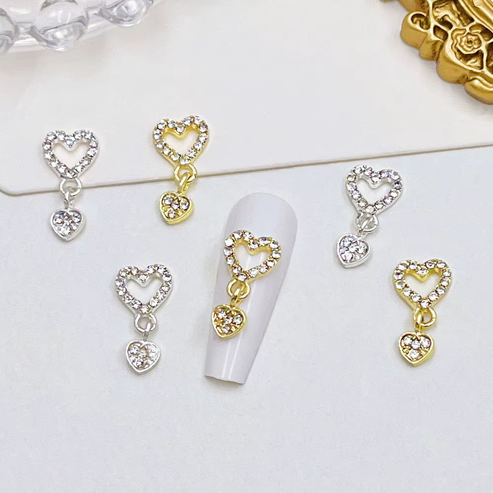 10 pièces coeur balancent ongles breloques 3D alliage luxe ongles strass argent or creux coeur ongle
