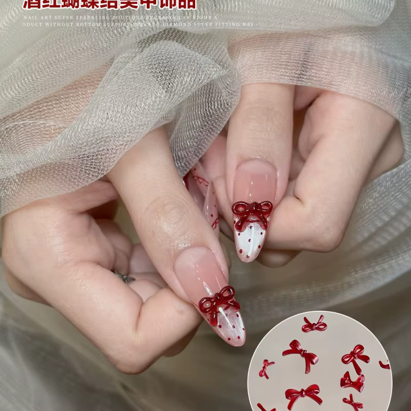 Accessoire de Nail Art avec nœud rouge vin doux