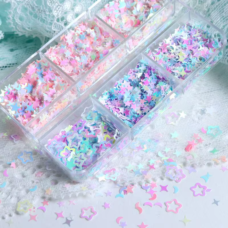 Accessoires pour nail art : étoiles irisées