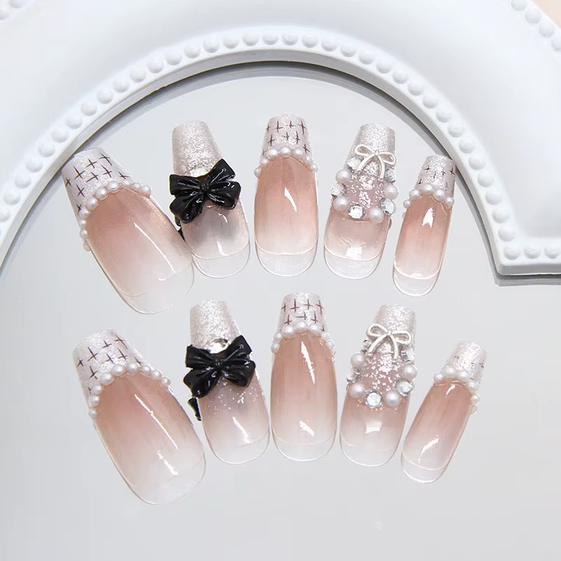 Faux ongles à presser tissés