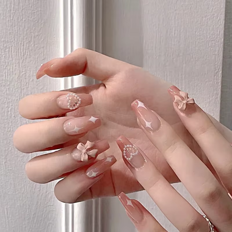 Faux ongles roses à pression