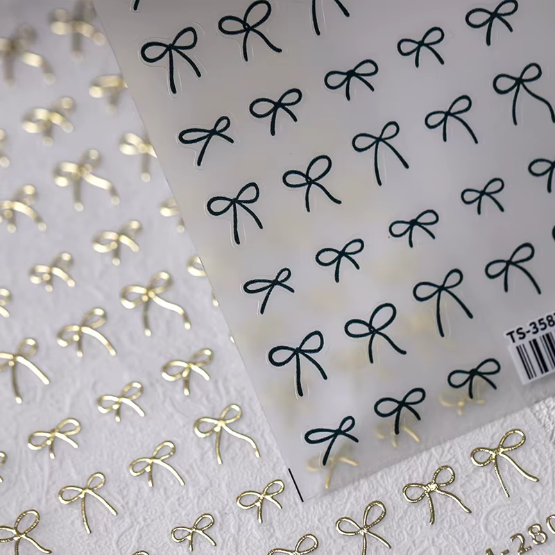 Autocollants 3D Adorables Dorés Argentés Blancs à Nœuds Papillon pour Ongles