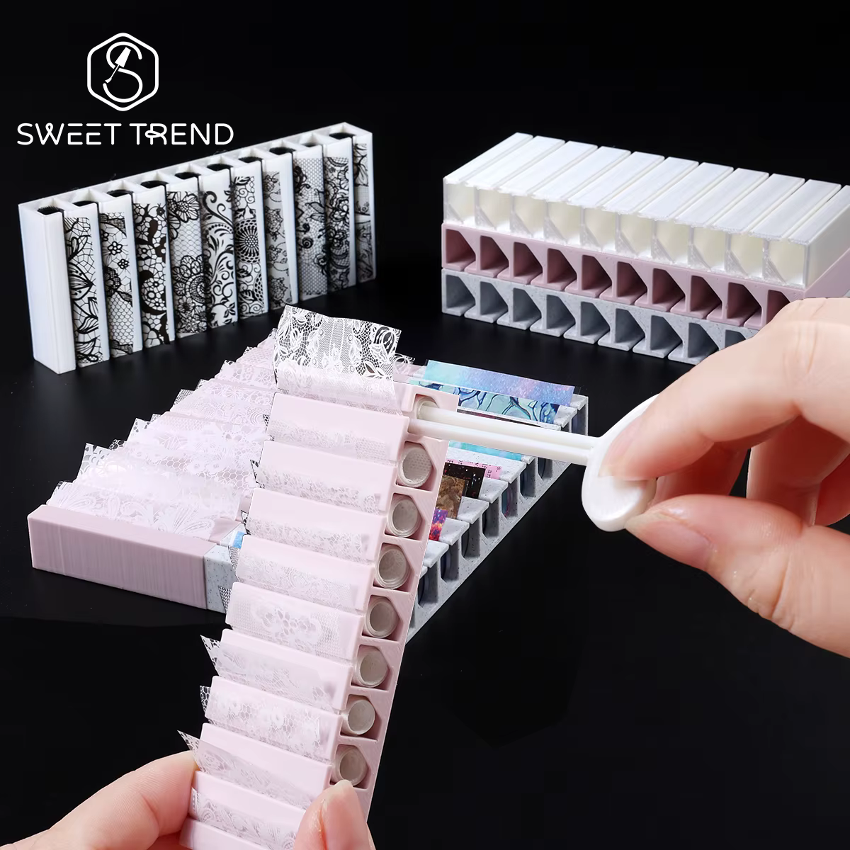 Boîte de rangement rotative pour feuilles de transfert d'ongles