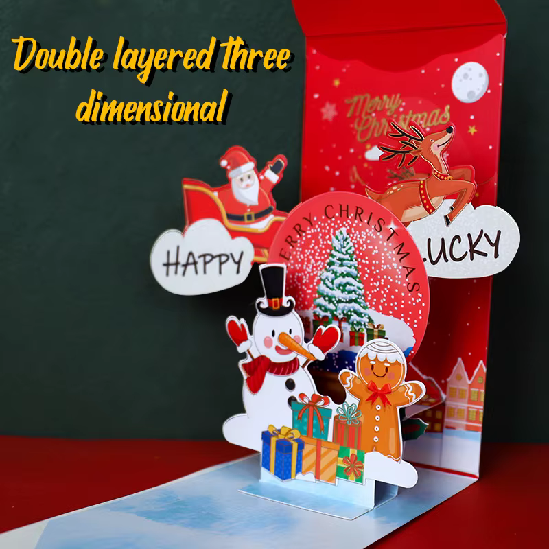 Conception originale d'enveloppes rouges de Noël stéréoscopiques 3D et cartes de vœux du jour de Noël pour la réveillon de Noël