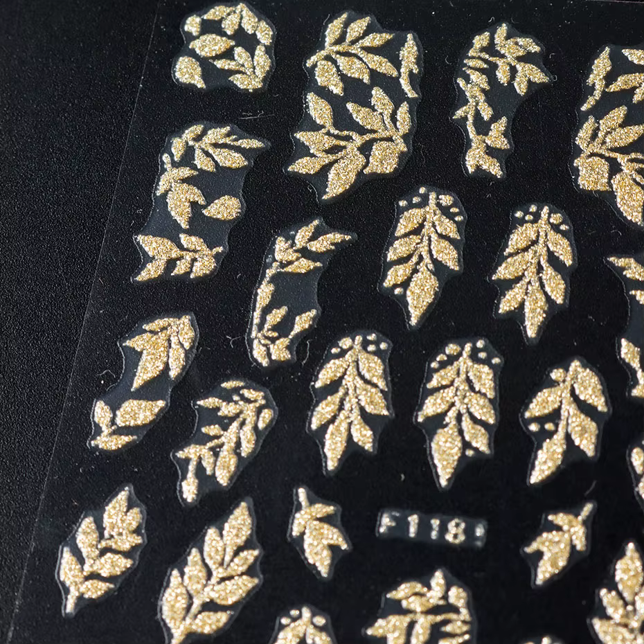 Autocollants pour ongles en feuilles dorées à paillettes