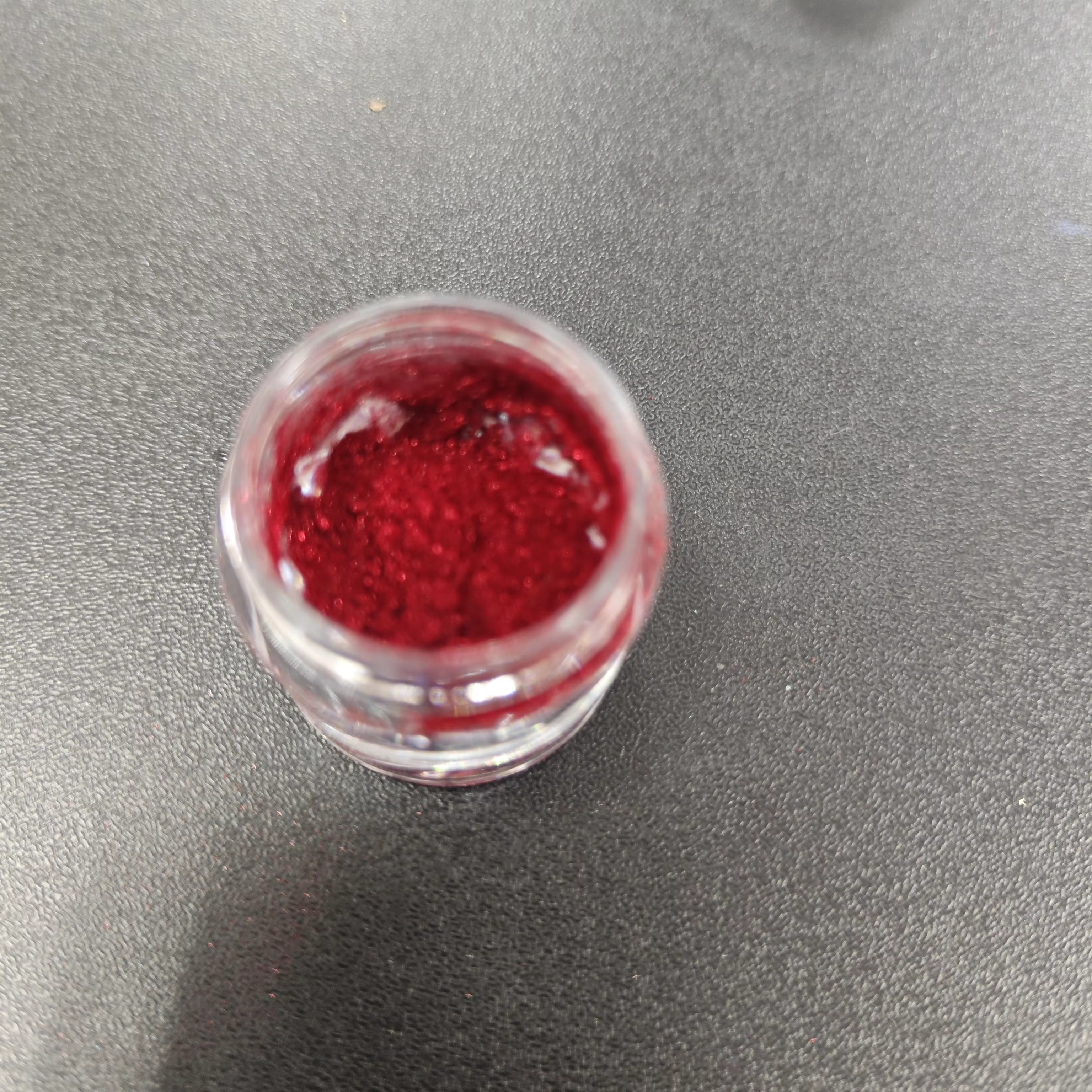 1 pot de poudre à ongles rouge de Noël