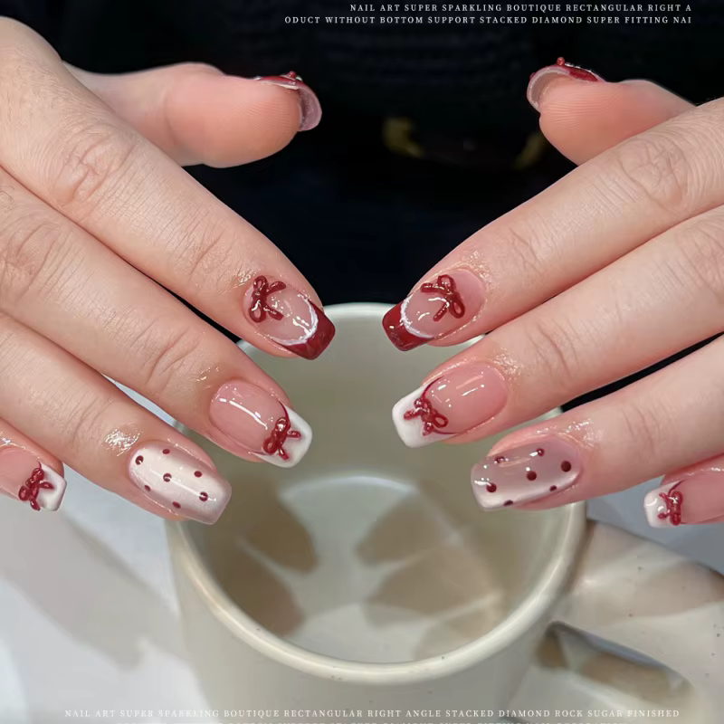 Accessoire de Nail Art avec nœud rouge vin doux
