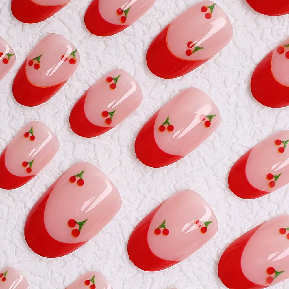 24 pièces – Améliorez votre look avec ce kit de faux ongles cerise à bords rouges
