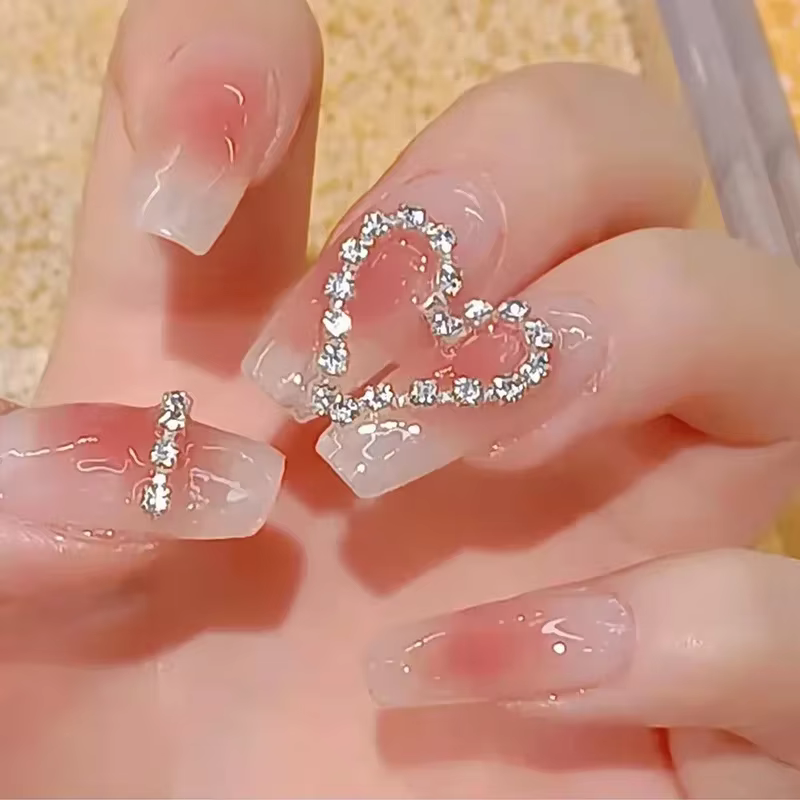 Faux ongles roses à pression
