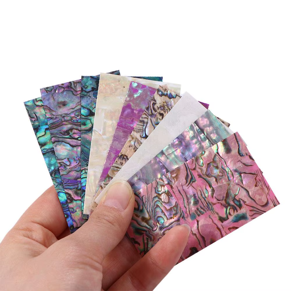 Feuilles autocollantes colorées pour les ongles