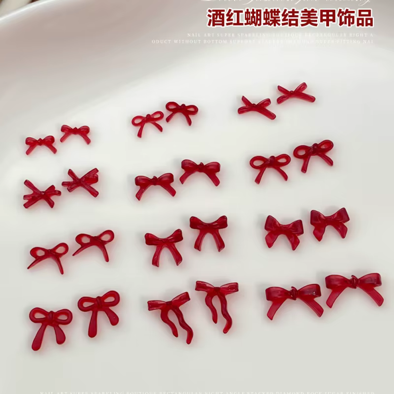 Accessoire de Nail Art avec nœud rouge vin doux