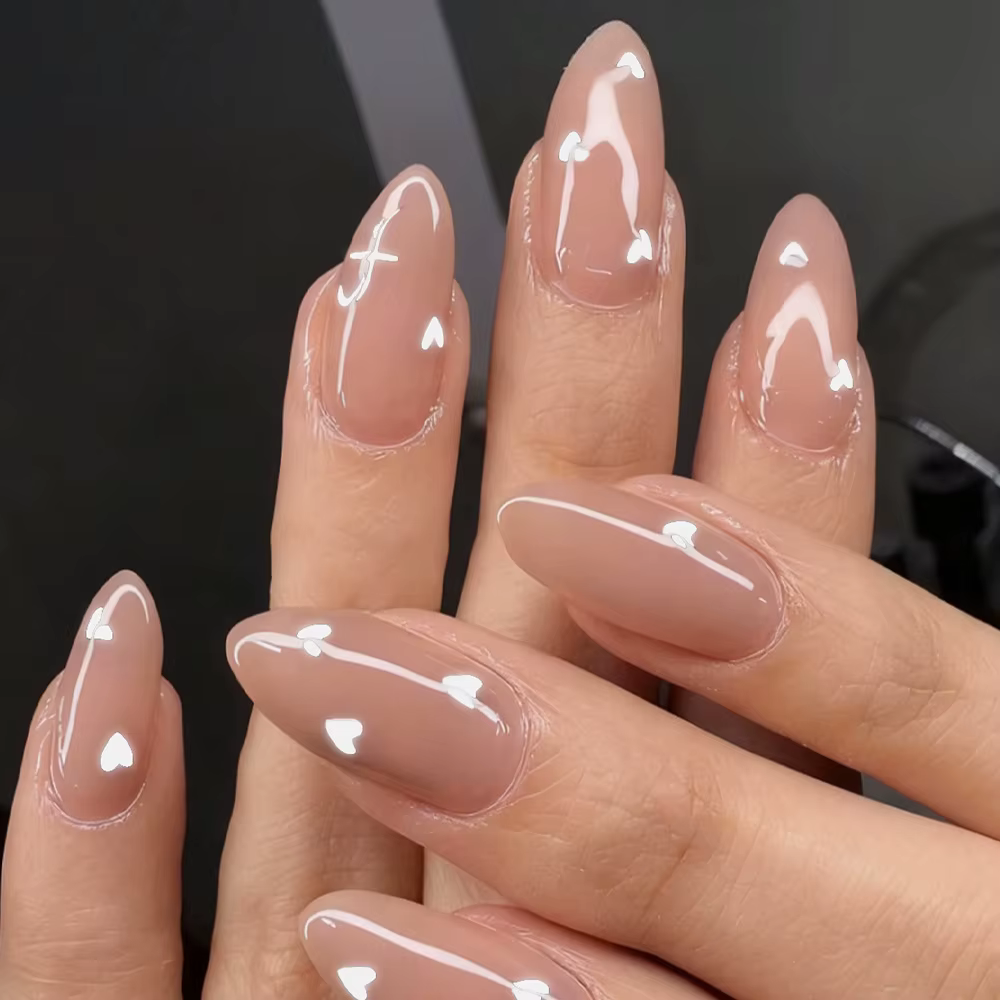 Faux ongles en amande rose clair pour filles