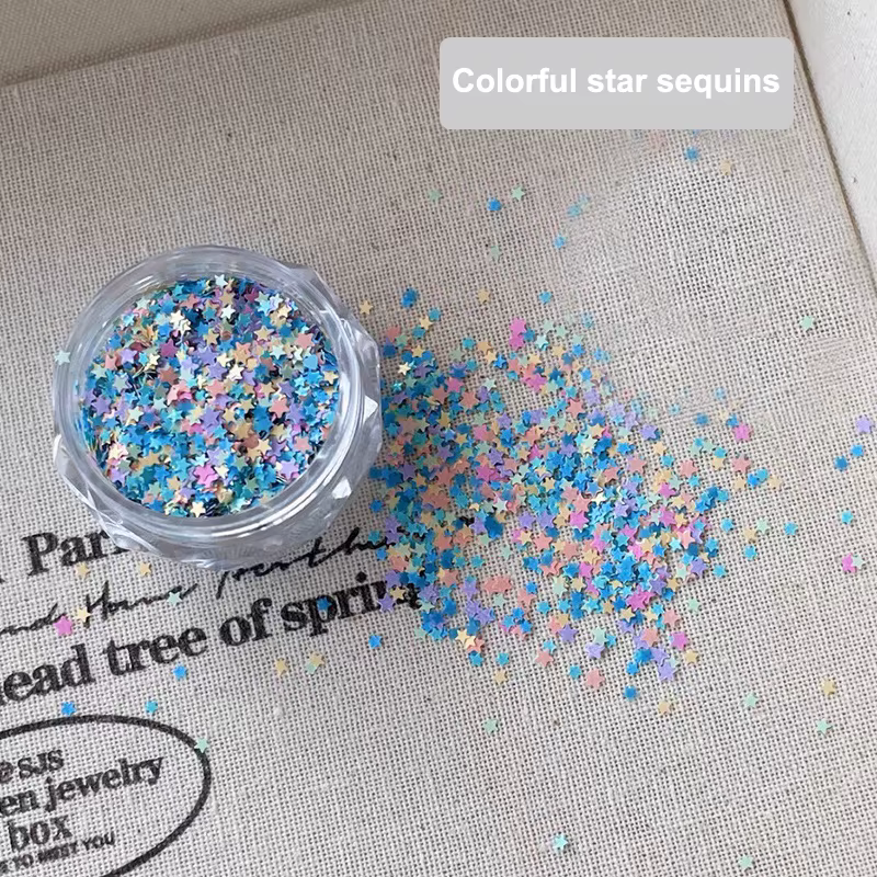 1 boîte de paillettes pour ongles en forme d'étoile