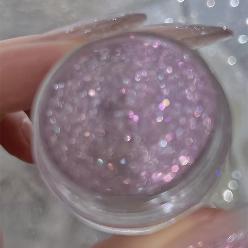 Poudre à paillettes rose scintillante pour ongles