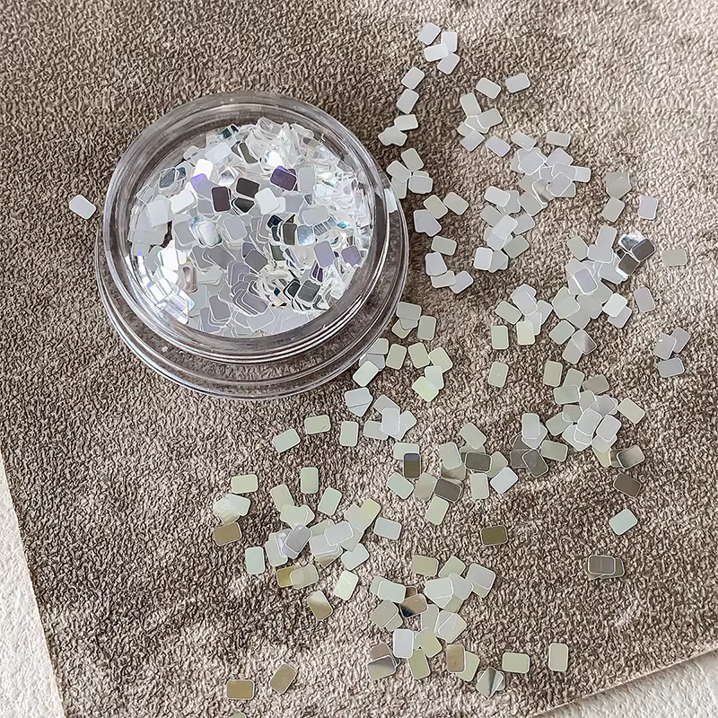 1 pot de paillettes carrées argentées pour ongles