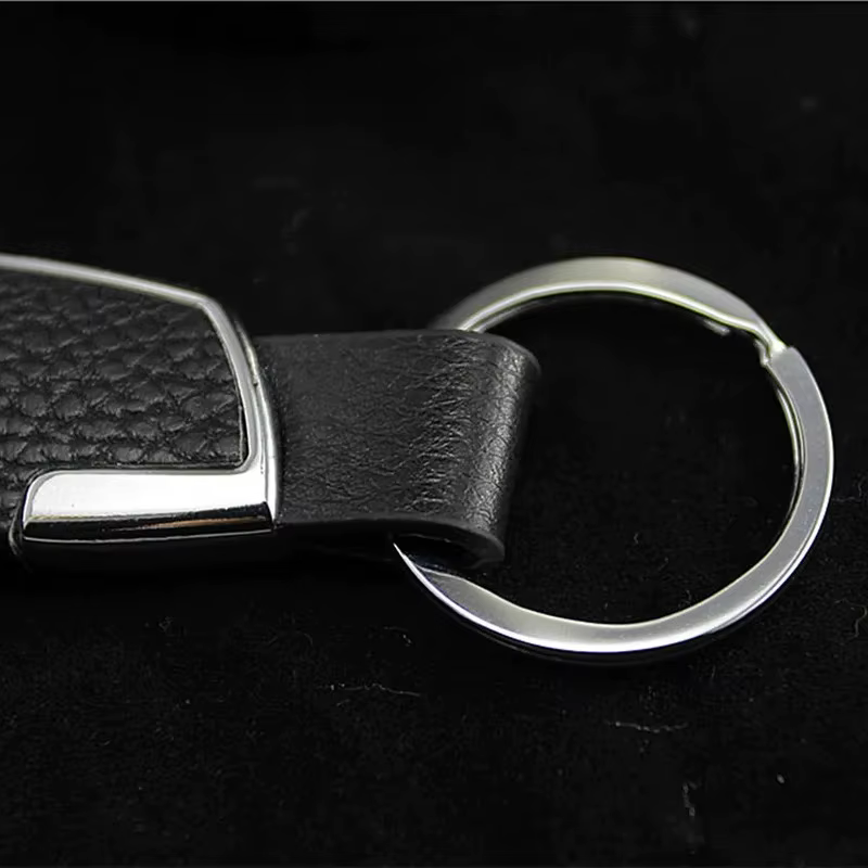 Porte-clés créatif en cuir avec design portable à accrocher à la ceinture, idéal pour les cadeaux souvenirs de vacances