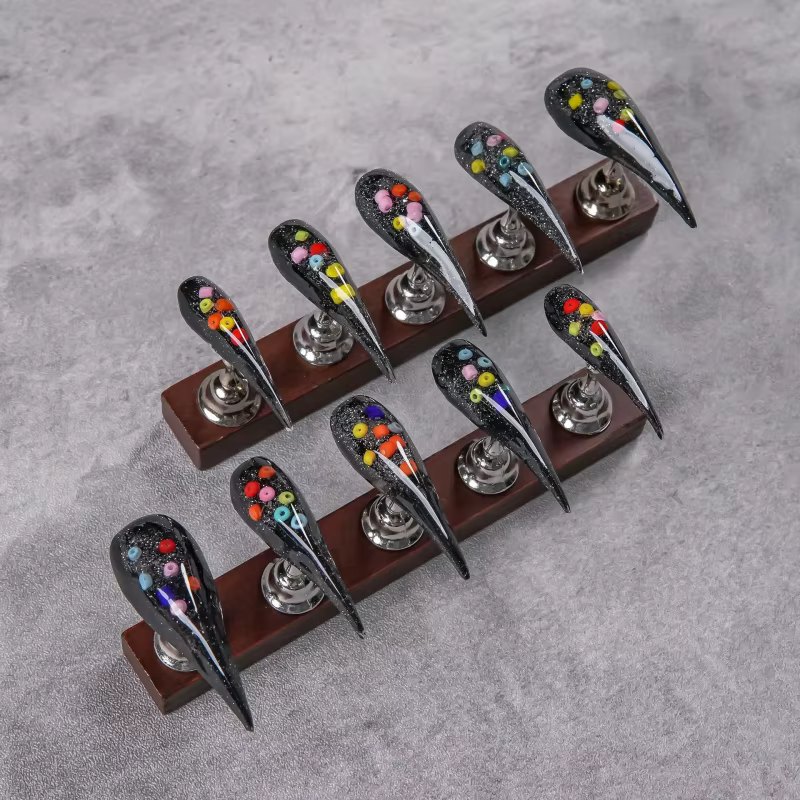Faux ongles à presser noirs et argentés à paillettes