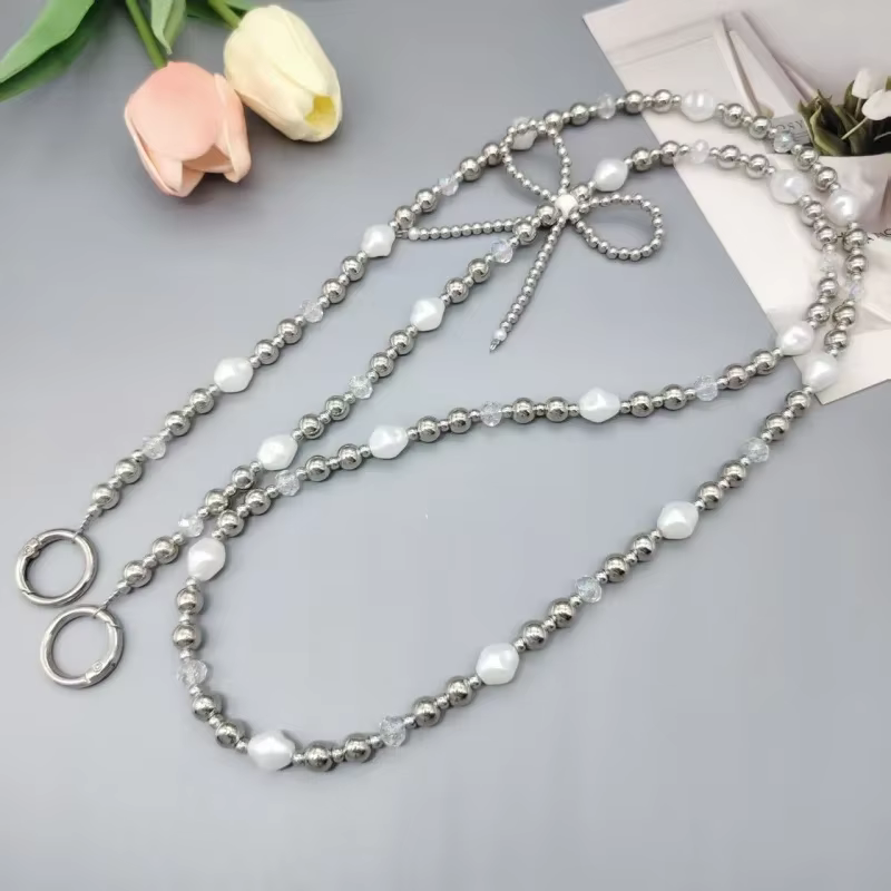 Nouvelle lanière créative pour téléphone portable, nœud en perles, ficelle de perles, accessoires de bagages à bandoulière, étui de téléphone, pendentif en chaîne