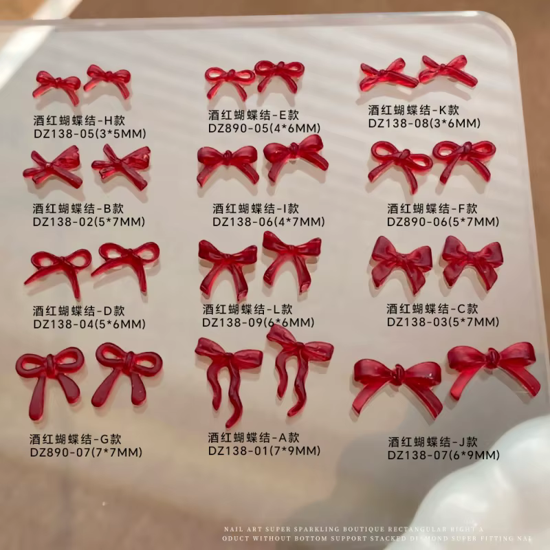 Accessoire de Nail Art avec nœud rouge vin doux