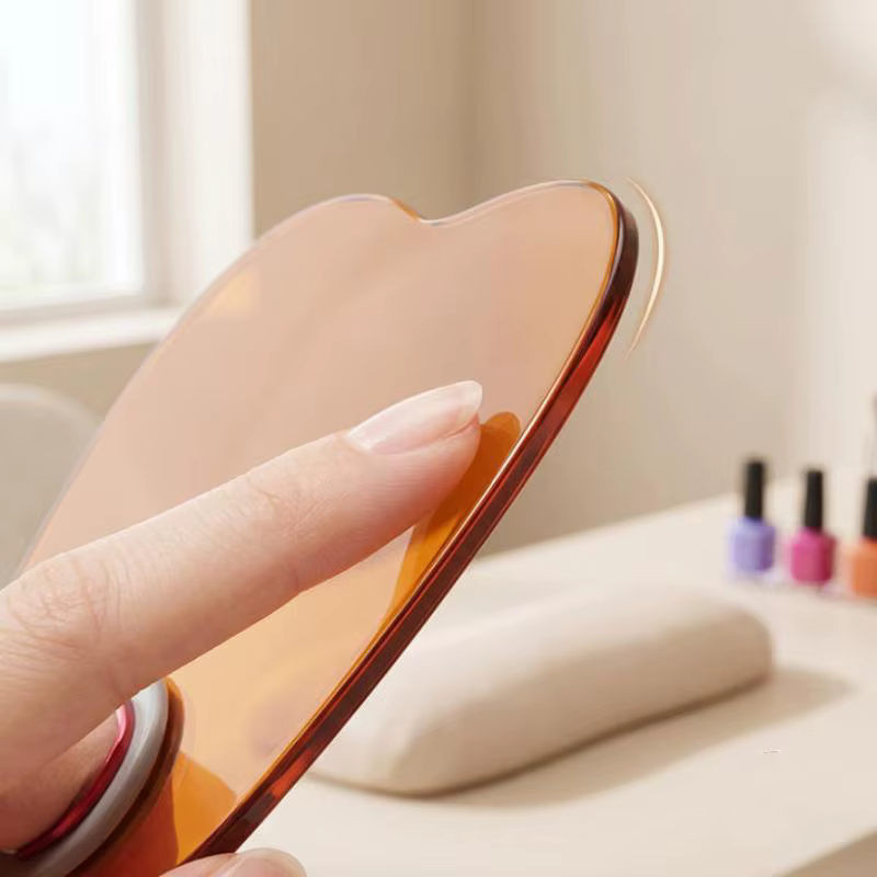 Plaque de protection pour lampe à ongles