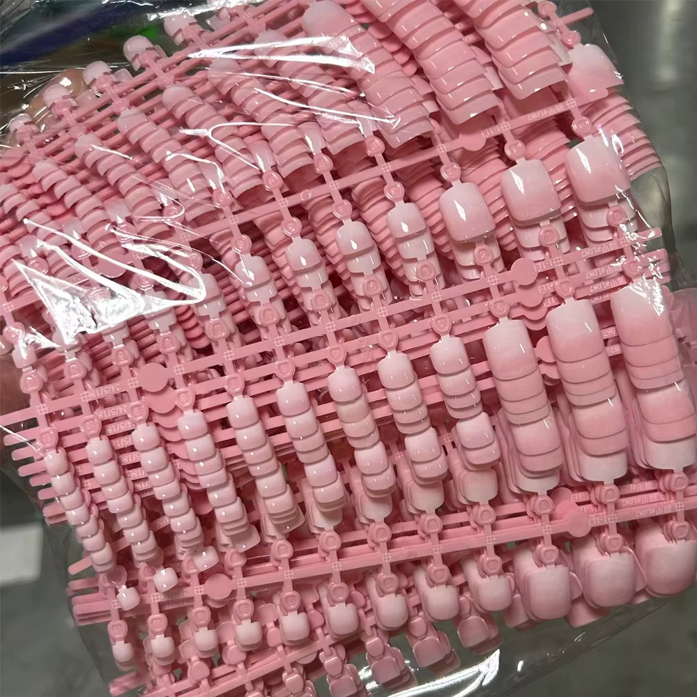 1 sachet de faux ongles de pieds carrés blancs et roses style français