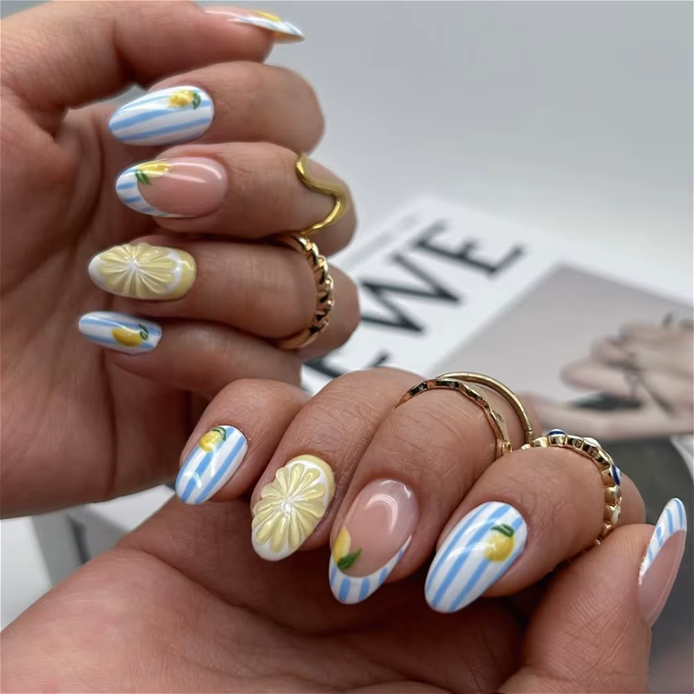 Faux ongles 3D citron rayés bleu et blanc